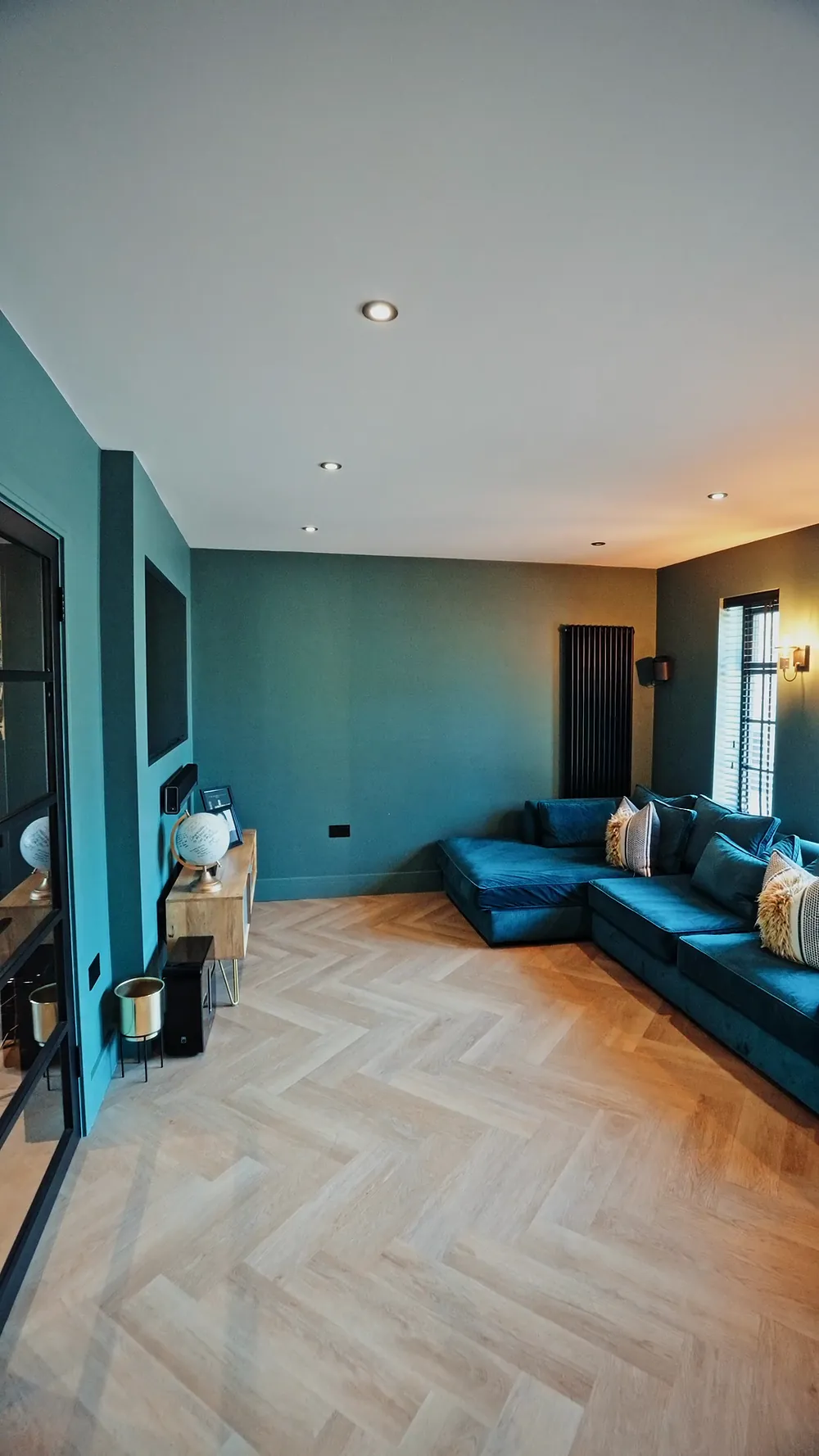 Open plan living space with herringbone floor